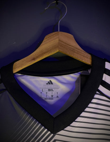 JUNIOR VISITANTE GRIS