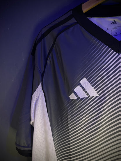 JUNIOR VISITANTE GRIS